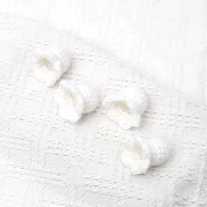 Handcrafted white crochet lily of the valley flower heads diy accessories for crafts.