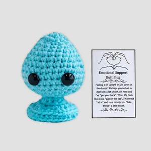 Handmade crochet emotional support toy detail view, funny novelty gift with companion card.