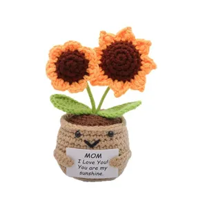 Handcrafted crochet sunflower potted plant detail view, cute emotional gift decoration.