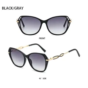 Schicke Oversized Sonnenbrille in Schwarz mit goldenen Bügeln und modischen Farbverläufen.