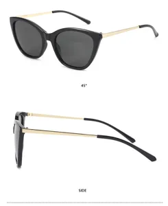 Detailansicht der Vintage-Katzenauge-Brille mit schwarzem Gestell und goldenen Bügeln.