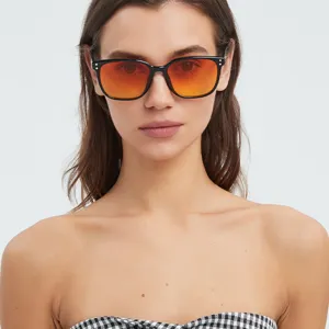 Fashion square sunglasses for women, vintage oversized black frame with orange gradient lenses.