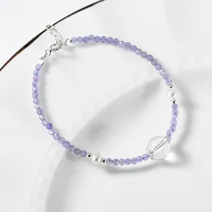 Elegante S925 zilveren tanzaniet parel witte kristal kraal armband minimalistische stijl.