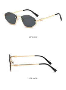 Polygon half-frame sunglasses with golden metal frame, chic grey lenses and stylish black temple tips.