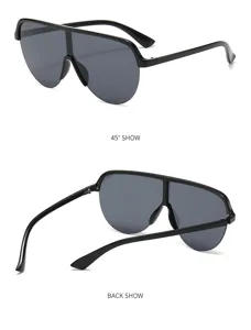 Detailansicht der übergroßen einteiligen Sonnenbrille mit schwarzem Rahmen und dunklem Schild.
