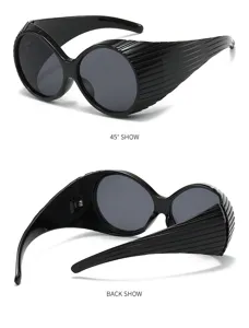 Trendy oversized oval sunglasses for women, retro black wrap-around frame runway fashion eyewear.