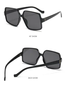 Vista detallada de gafas de sol negras cuadradas de tendencia para hombres y mujeres.