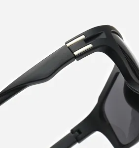 Detailed view of trendy black sunglasses for men, showcasing stylish matte frame and hinge.