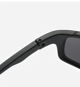 Close-up detail of sunglasses hinge and screw connection, showing fine workmanship.