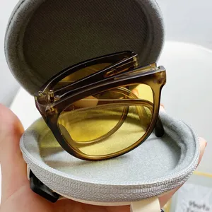 Klappbare Sonnenbrille für Damen, trendige polarisierte Brille mit rundem Etui, braun.