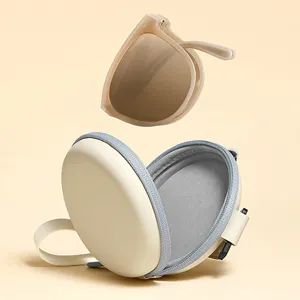 Faltbare polarisierte Sonnenbrille mit stilvollem tragbarem rundem Schutzetui Detail.