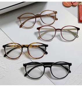 Gafas redondas clásicas en varios colores, lentes transparentes para uso diario y estilo.