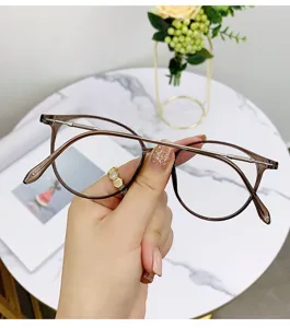 Montatura per occhiali rotonda color tè freddo ultra leggera da donna, anti luce blu.