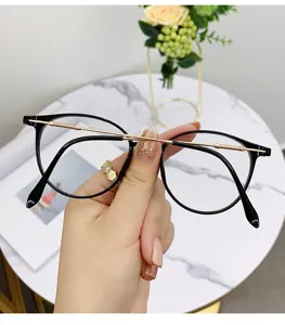 Montatura per occhiali anti-luce blu leggera da donna, eleganti occhiali tondi neri da vista.