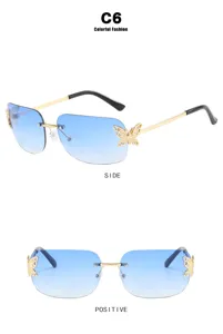 Rimless gradient blue sunglasses for women, trendy metal frame with rhinestone butterfly.