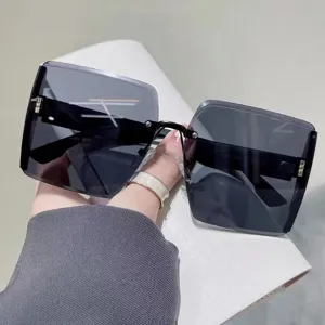 Gafas de sol cuadradas y sin montura para mujer, lentes marrones, alta protección UV.