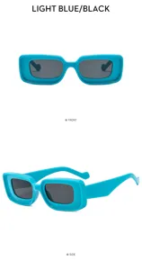 Vista detallada de gafas de sol de mujer de moda con montura cóncava azul claro.