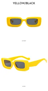 Vista detallada de gafas de sol amarillas elegantes con montura empotrada única, tendencia.