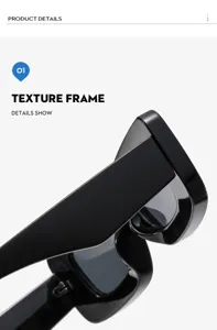 Vista detallada de gafas de sol negras con montura gruesa y diseño moderno elegante.