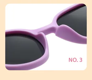 Detailed close-up view of cute purple silicone children sunglasses with dark UV lenses.