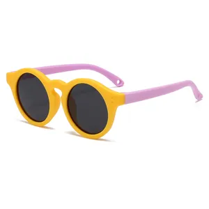 Bonitas gafas de sol redondas polarizadas para niños con montura colorida muy moderna.