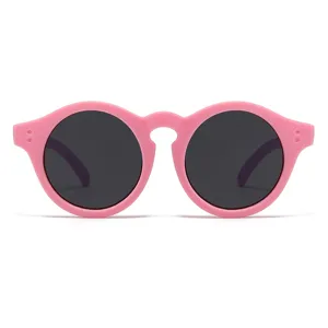 Gafas de sol polarizadas redondas retro para niños en rosa, gafas infantiles muy chics.