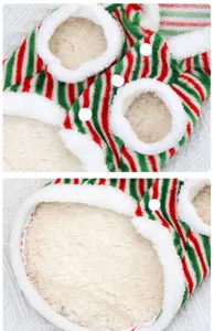 Close-up detail of Christmas pet clothing, red and green stripes with plush fleece lining.