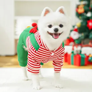 Christmas pet dog clothes detail showing red white stripes and green cute antlers design.