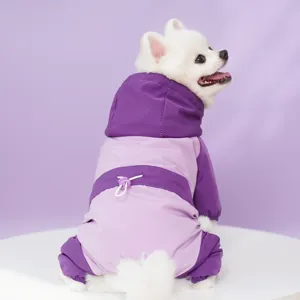 Close-up detail of the pet dog windbreaker featuring purple color block, hood, and drawstring waist.