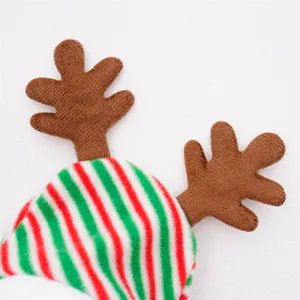 Cute Christmas pet costume detail showing plush antlers and red green striped hat for dogs.