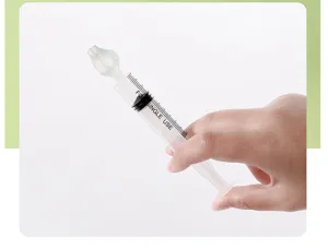 Detailed view of baby nasal aspirator syringe with silicone tip and clear measurement scale.
