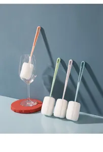 Detail view of long handle cup cleaning sponge brush featuring colorful pastel handles.