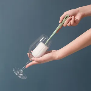 Long handle cup brush with sponge head for cleaning water bottles and wine glasses.