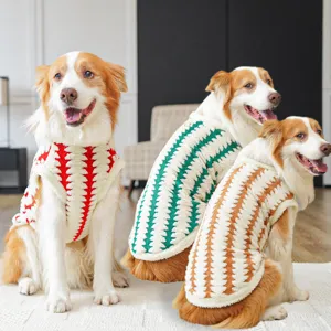 Winter warm pet fleece vest for dogs and cats, soft plush apparel with cute printed pattern.