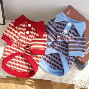 Close-up of autumn winter striped pet dog polo shirt, warm two-leg dog apparel details.