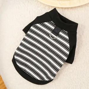 Detailed view of black and white striped pet two-leg clothes with metal D-ring and round neck.