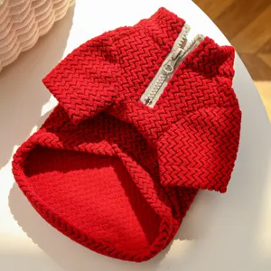 Close-up of red textured pet sweater detail, featuring a half-zipper design for small dogs cats.