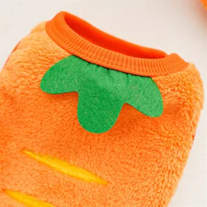Close-up detail shot of cute carrot-shaped pet winter fleece clothing for small dogs and cats.