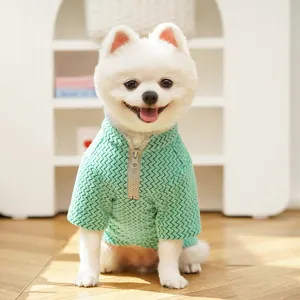 Detailed view of cute pet sweater with half zipper, mint green knit dog apparel for winter.