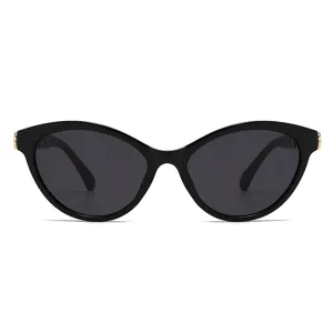 Eleganti occhiali da sole cat-eye oversize da donna, con protezione UV e stile chic.