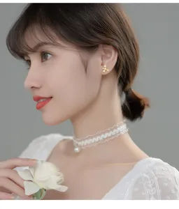 Elegant S925 silver frosted gold flower earrings detailed view worn by model, sweet style.
