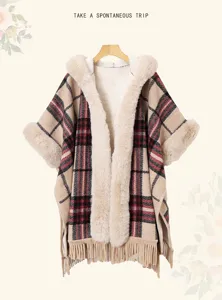 Thickened plaid hooded cape with faux fur collar and fringe trim, vintage warm winter poncho.