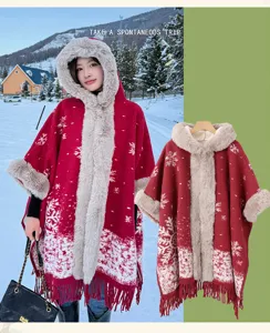 Detailed view of the winter thick fleece-lined hooded poncho with faux fur trim and snowflake pattern.