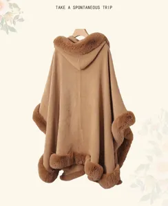 Plush fur hooded cape detail, winter warm faux fur trim shawl, elegant outerwear view.