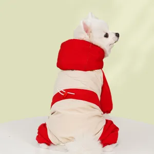 Detailed view of a red and white pet ski suit for dogs and cats, cozy winter four-leg jumpsuit.