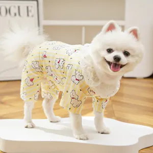 Cute yellow striped dog onesie with puppy print and lace collar for small pets detail view