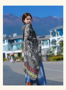Ethnic style knitted hooded cloak for women, cozy and stylish outdoor wear for autumn.