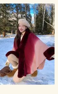 Detailed view of winter gradient poncho cape with plush collar and cuffs, elegant woolen knitwear.