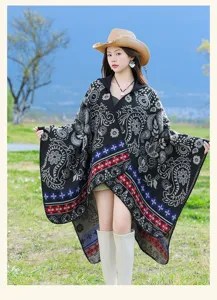 Detailed view of the ethnic style knitted cloak with paisley pattern and warm design for outdoor.