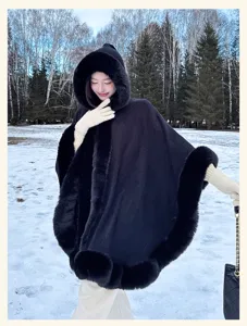Details of women winter hooded furry collar cape cloak, elegant warm fashion outer wear.